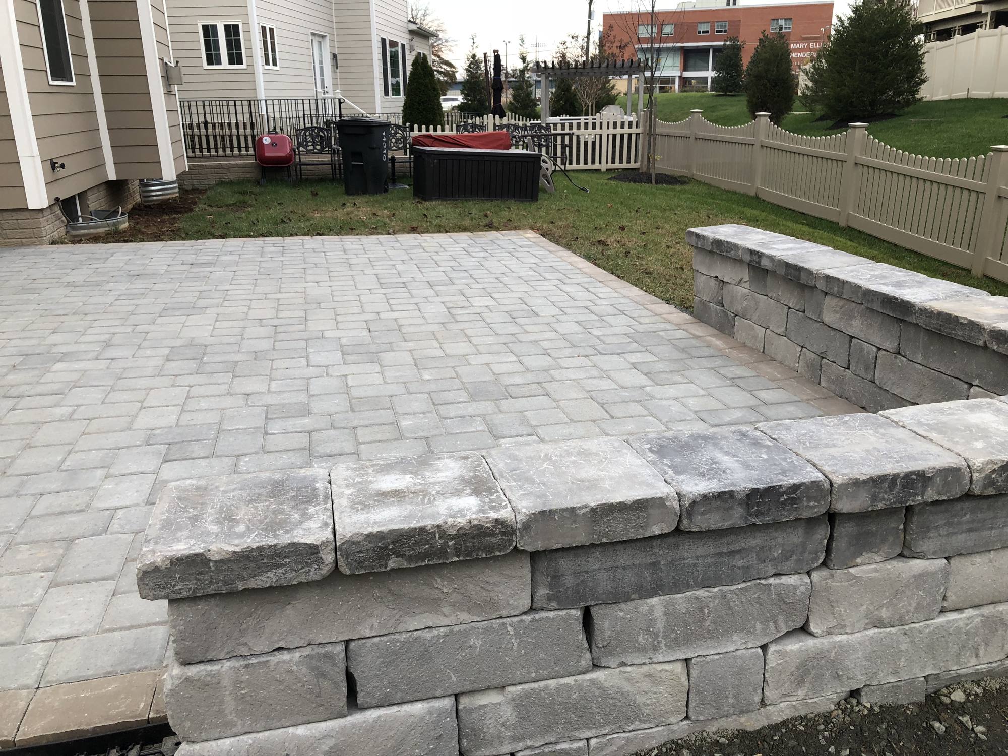 Paver patio and sitting wall corner detail in Northern Virginia